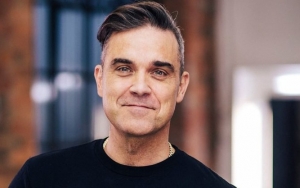 Robbie Williams Reveals Combination of Cocaine and Haunted House Made Him Suicidal