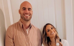 Jana Kramer Says Topless Pic on Husband's Phone Was Sent by Bot