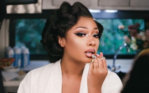 Megan Thee Stallion Hits Back at Fan Trolling Her for Stressing Over Research Paper Assignment