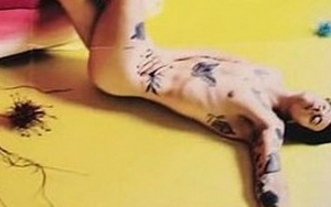 Harry Styles Poses Naked for New Solo Album Artwork