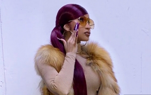 Cardi B Sparks Debate Over Her Giant Fur Coat at NBA All-Star Game