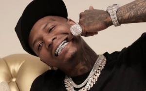 MoneyBagg Yo Drives Fans Wild by Taking Off His Diamond Grills - See His Fresh White Teeth