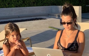 Kourtney Kardashian Silences Mom Shamer Telling Her to Cut Her Son's Hair