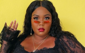  Lizzo Strips Down to Sheer Lingerie to Show 'Some Love' on Body Part She Doesn't Like