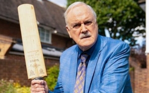 John Cleese Pokes Fun at Surgery to Remove Cancerous Tumor From Leg