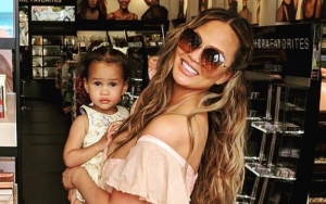 Chrissy Teigen Wakes Up From Boob Surgery to Funny Note From Daughter Luna