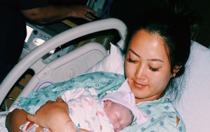 Golf Star Michelle Wie Offers First Look at Baby Girl