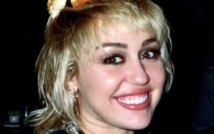 Miley Cyrus Says She Doesn't 'Need a Top' as She Goes Topless