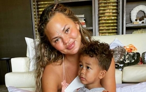 Chrissy Teigen Blames Son Miles' Tendency to Stay 'Butt A** Naked' for Lack of Social Media Posts