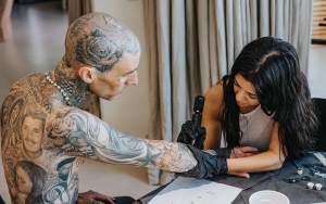 Kourtney Kardashian Tattoos 'I Love You' on Travis Barker's Arm and He Loves It 