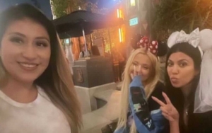 Kourtney Kardashian Sparks Engagement Rumors With Minnie Mouse Bridal Ears During Disneyland Trip