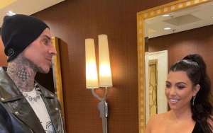 Kourtney Kardashian and Travis Barker Have Steamy Makeout Session at UFC 264 