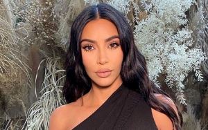 Kim Kardashian Bares Her Butt in Skimpy Black Thong Bikini