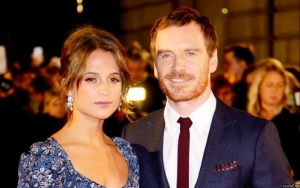 Alicia Vikander Carries Baby During Ibiza Vacation With Michael Fassbender