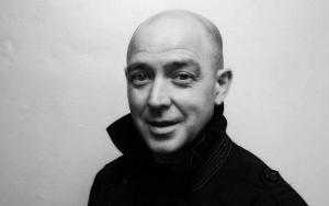 Oasis' Former Drummer Tony McCarroll Hospitalized After Suffering Heart Attack 