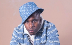 DaBaby Nearly Loses $20K Diamond Ring After Falling Off Stage During Las Vegas Performance