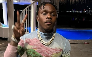 DaBaby Draws Backlash for Not Supporting Three-Month-Old Daughter's Neck in New 'Corny' Video