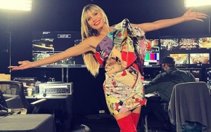 Heidi Klum Flashes Her Bare Butt in Cheeky Christmas Photo