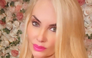 Coco Austin Slams Hater for Calling Her a 'Train Wreck'