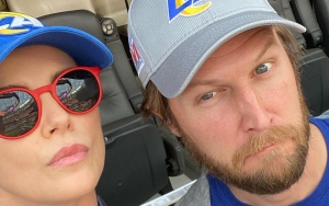 Charlize Theron Introduces Her 'Mystery Man' at Super Bowl on Instagram 