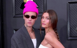 Justin Bieber and Hailey Baldwin Spark Pregnancy Rumors With Suspicious Bump on Grammys Red Carpet