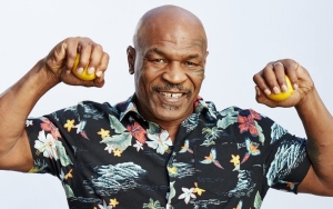 Mike Tyson Claims He Punched Fan During Recent Flight Because He Was Thrown a Water Bottle