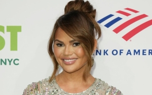 Chrissy Teigen Fires Back at Hater Who Accused Her of Having 'Constant Liposuction'