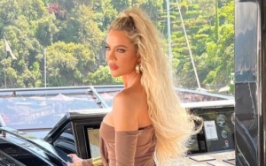 Khloe Kardashian Laughs Off Her Love Life After Being Captured Alone at Kourtney and Travis' Wedding