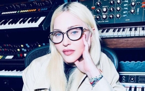 Madonna Hides Her 'Ugly' Teeth With Grills