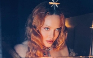 Busty Madonna Sizzles in Lacy Corset to Celebrate Re-Release of Controversial 'Sex' Book