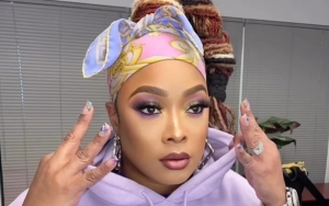 Da Brat Bares Baby Bump as She's Pregnant With First Child