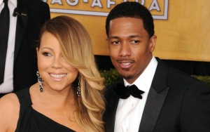 Nick Cannon Likens His and Mariah Carey's Marriage to Trump and Putin Living in the Same House