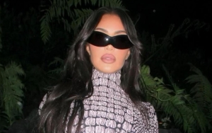 Kim Kardashian Oiled Up in New 'Provocative' SKIMS Rubber and Faux Leather Swimwear Campaign