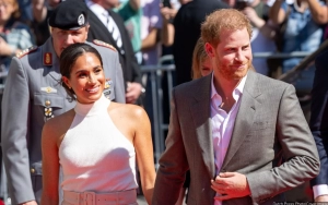Prince Harry Wishes Meghan Markle and Their Kids Were With Him While He's on Charity Trip to Asia