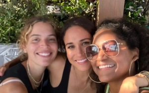 Meghan Markle Beaming at Birthday Celebration, Wearing Personalized Pendant as Nod to Her Kids