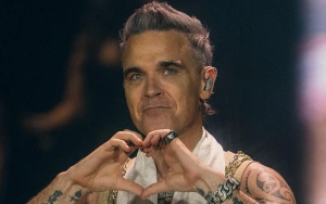 Robbie Williams Reflects on 'Detrimental' Side to His Fame in Docu-Series