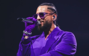 Maluma Keeps His Cool After a Fan Tries to Touch Him Inappropriately During His Show