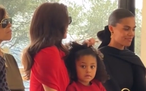 Kylie Jenner and Daughter Stormi Twinning in Fiery Red Ensembles at Paris Fashion Week
