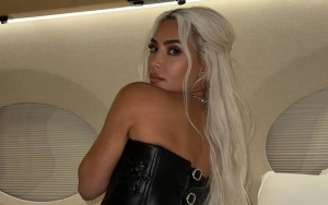 Kim Kardashian Trolled for Faking Work Out Video