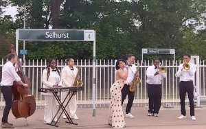RAYE Offers Spectacular Performance of 'Genesis' on Train Station Platform