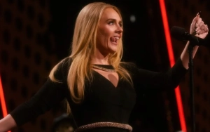 Adele Tells Fans She May 'Pass Out' Onstage Due to Tight Spanx