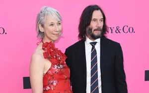 Keanu Reeves and Alexandra Grant Step Out at MotoGP Race in Germany