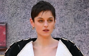 Emma Corrin Stuns in Bold Jacket at 'Deadpool and Wolverine' Premiere