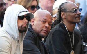 Eminem Teams Up With Dr. Dre and Snoop Dogg to Take Over NYC With Flash Mob