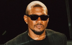 Usher Reveals Neck Injury After Posptponing More Shows