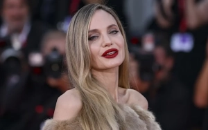 Angelina Jolie Discouraged From Singing by Her Ex