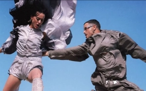 Katy Perry Skydiving and Making Out With Male Model in Raunchy Video for 'I'm His, He's Mine'