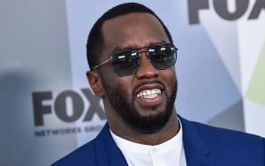 Diddy Arrest Footage Shows Him Being Led Out of Manhattan Hotel in Handcuffs