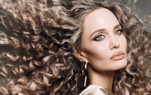 Angelia Jolie Exudes Style and Sophistication With Stunning Disco Curls