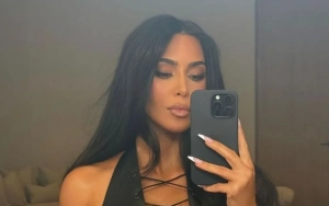 Kim Kardashian Icing Her Back to Relieve Pain in Sultry Selfie
